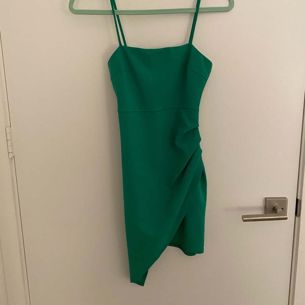Green asymmetrical dress.